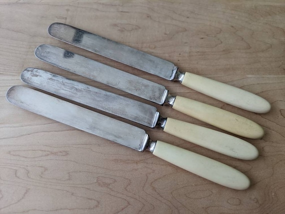 Antique LANDERS FRARY & CLARK Faux Ivory/bakelite Handle Silver