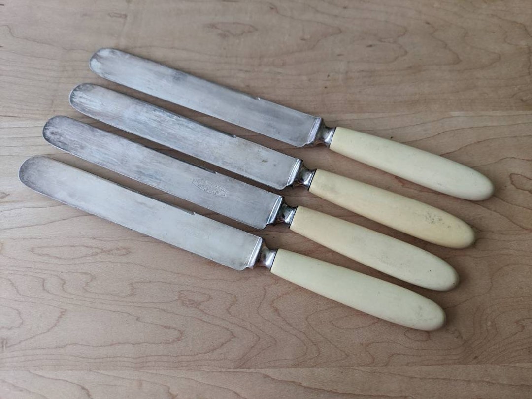 Antique LANDERS FRARY & CLARK Faux Ivory/bakelite Handle Silver