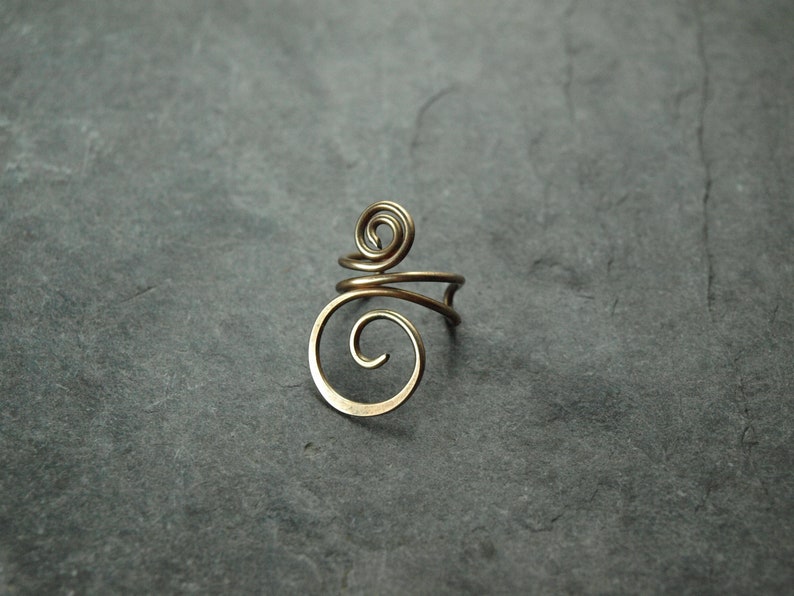 Ear clip simple, spiral Bronze antik