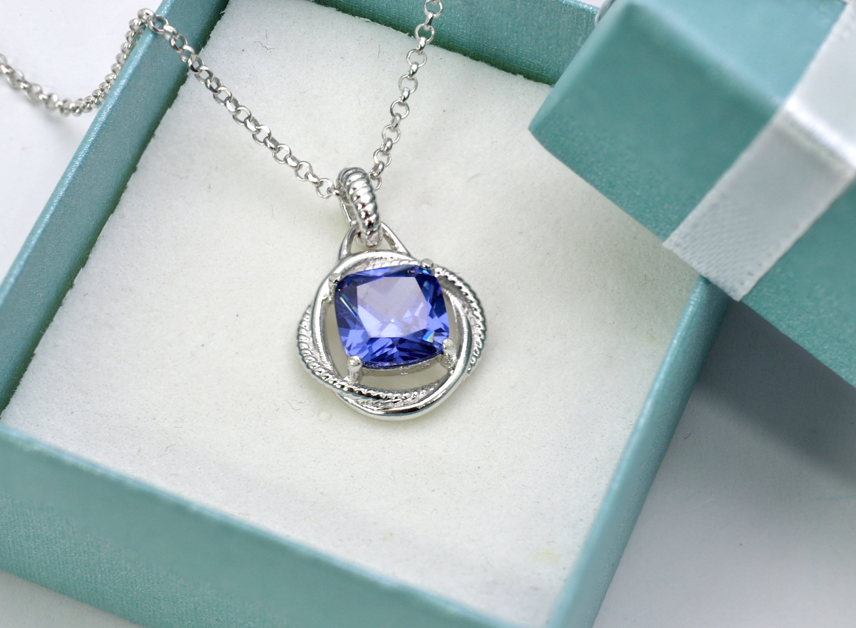 Details about .925 Sterling silver Tanzanite Cushion cut Infinity Pendant/Earrings Details about .925 Sterling silver Tanzanite Cushion cut Infinity Pendant/Earrings