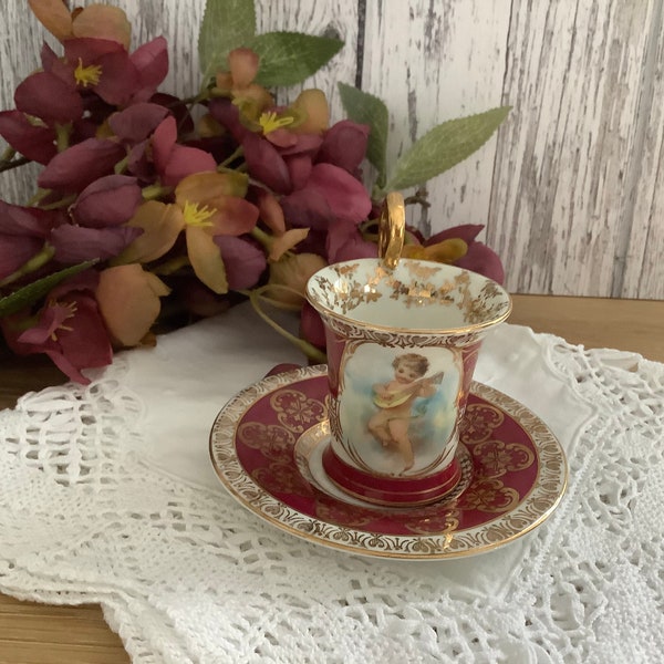 Elegant Chocolate Cup Set.    Royal Vienna...Dresden.....Cherubs. Hand Painted..vintage china