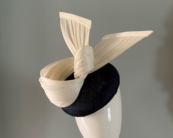 Navy sinamay perching vintage beret hat embellished with sculptured Ivory bow.