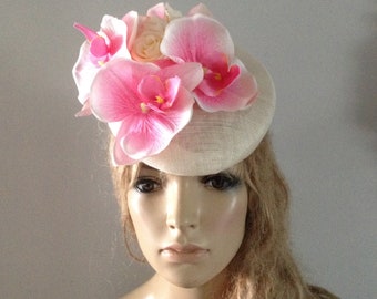 Ivory perching beret hat adorned with pale pink  silken orchids & roses.