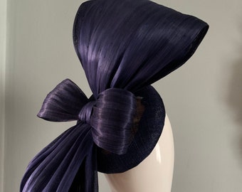 Navy Blue perching beret hat fascinator adorned with a sculptured silk abaca bow.size is approximately 43 cm x 29cm