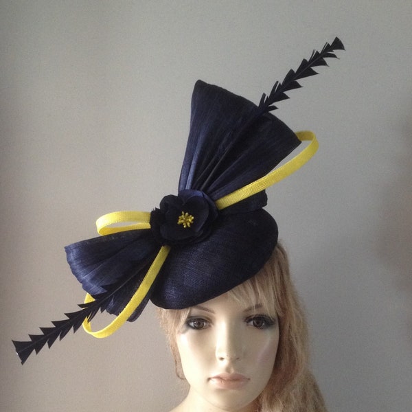 Navy sinamay beret hat adorned with a silk abaca bow hand cut yellow & navy feathering silk flowers