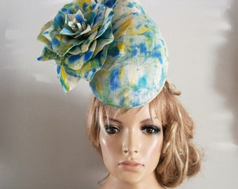 silk abaca 3d perching pod,hat embellished with ton-sur-ton silk flower,here in blues,greens & yellows
