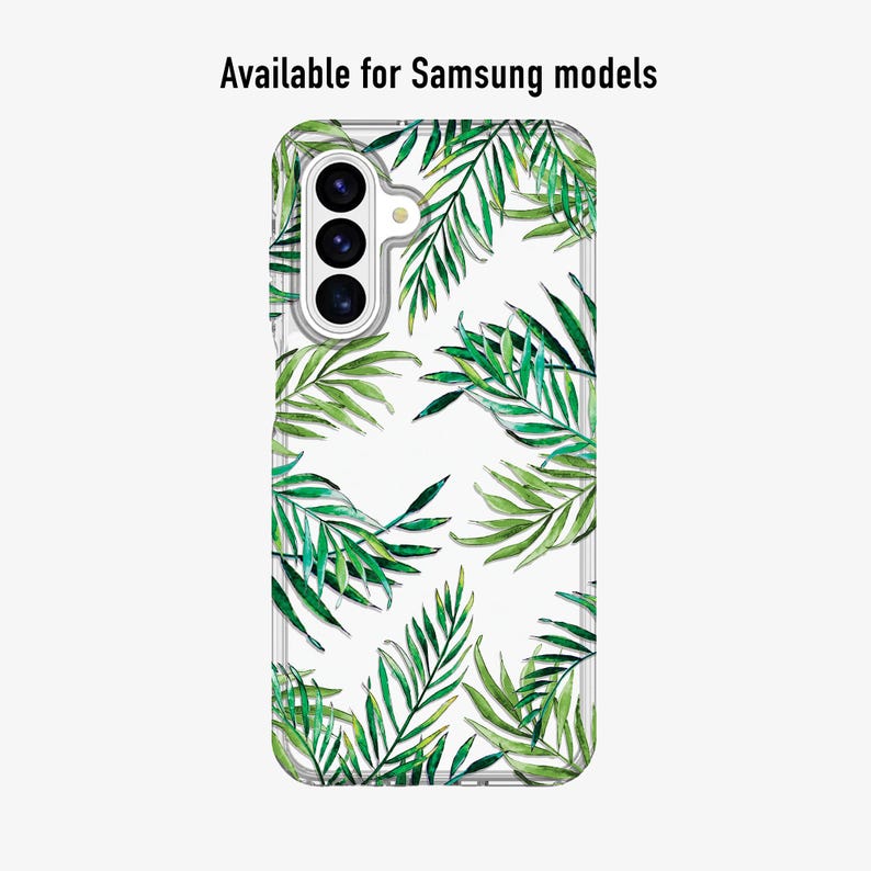 May include: Clear phone case with a green watercolor palm leaf pattern. The case is designed for Samsung models. The text "Available for Samsung models" is printed at the top of the case.