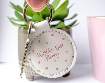 El mejor llavero de niñera de piel sintética del mundo. Llavero redondo o colgante para bolso, regalo perfecto para el Día de la Madre.