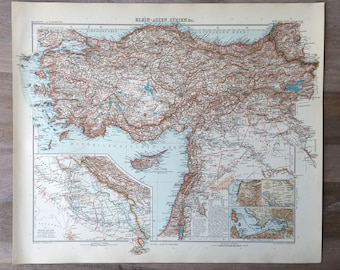 May include: A vintage map of Asia Minor, also known as Anatolia, with the title "Klein-Asien, Streifen Nr." The map shows the geographical features of the region, including mountains, rivers, and cities. The map is printed on a light beige paper with blue and brown lines.