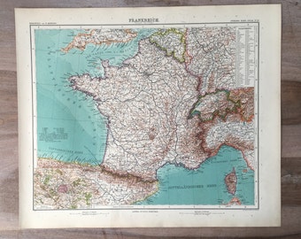 May include: A vintage map of France, printed in German, with the title "FRANKREICH" at the top. The map shows the country's borders, major cities, and geographical features. The map is printed on a cream-colored paper with a light blue background.