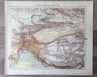 May include: A vintage map of Vorder-Indien und Inner-Asien, showing the geographical features of the region. The map is printed in black, brown, and blue ink on a cream-colored paper. The map includes the text "Vorder-Indien und Inner-Asien" at the top.