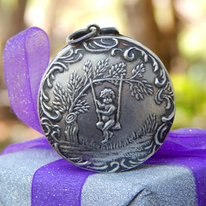 Pre-Loved Georgian Era Style Swinging Cherub Repoussé Sterling Silver Reversible Pill Box/ Locket Compact /Solid Perfume Pendant - It Opens!