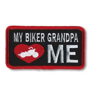 May include: Black embroidered patch with red stitching. It says "My Biker Grandpa loves me" with a red heart containing a white motorcycle silhouette.