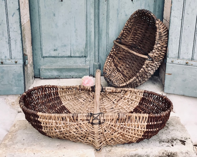 A fabulous matched pair of French vendage or harvest baskets - great retail display