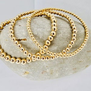 14K Gold Filled Beaded Bracelets. Stretch Bracelet. Layering Bracelet. Stacking Bracelets. Minimalist Bracelets. Trendy Bracelets.