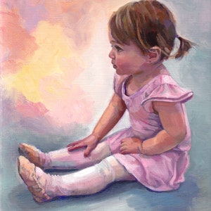 May include: A young girl in a pink dress and white tights sits on a blue background. She is wearing ballet shoes and has her hair pulled back in a ponytail. The background is a soft pink and yellow.