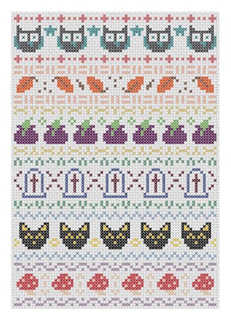 A cross stitch on off-white aida fabric featuring six different fall-themed repeating  patterns and six different repeating borders. From top to bottom, the fall patterns are owls, leaves, cauldrons, gravestones, black cats, and mushrooms.