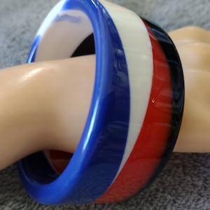 Vintage Blue, Red, Black and White Striped Lucite Bangle Bracelet