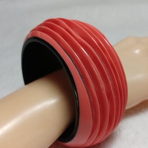 Vintage SMALL Pink/Peach and Black Carved Lucite Bangle Bracelet