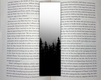 May include: A black and white image of a forest with a quote from the book "Shadow of the Titanic" about the ship's captain, Edward Smith, and the ship's chief designer, Thomas Andrews. The quote reads: "D-you Titanic sank this morning after collision ice. Ous loss life. Full particulars later."