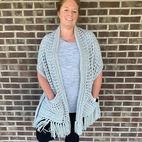 a shawl with pockets