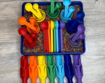 Rainbow colored eco scoops, scooping activity, sensory play scoops, sensory filler scooping set, sensoryplay eco scoops, fizzy play scoops