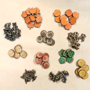 May include: Assortment of Halloween themed wooden craft supplies.  The set includes bats, pumpkins, ghosts, spiders, eyeballs, leaves, mummies, and sunflowers.
