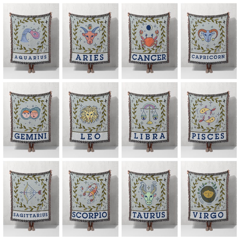 May include: Twelve woven tapestry throw blankets featuring the astrological signs of the zodiac. Each blanket is a light blue color with a green border and a white background. The signs are illustrated in a cartoon style with a variety of colors. The signs are: Aquarius, Aries, Cancer, Capricorn, Gemini, Leo, Libra, Pisces, Sagittarius, Scorpio, Taurus, and Virgo.