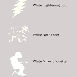 May include: Three white graphic designs on a light gray background. The top design is a lightning bolt. The middle design is a creature with a long neck and a long tail. The bottom design is a person playing a guitar.