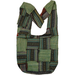 May include: A green, brown, and blue patchwork shoulder bag with a woven design. The bag has a single strap and a flap closure.