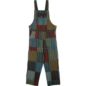 May include: Patchwork overalls in shades of blue, green, and red. The overalls have a bib and adjustable straps.