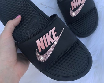 blue and gold nike slides