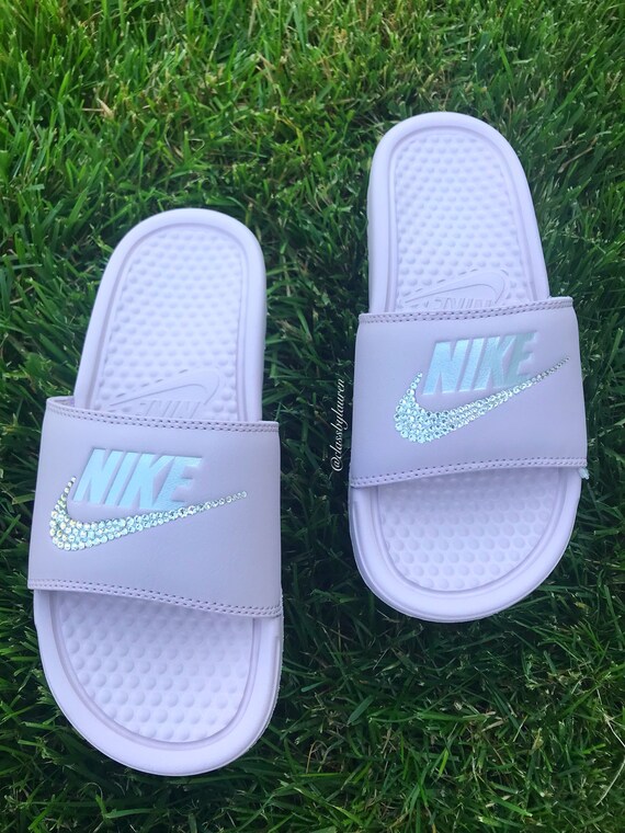 nike slides with pink logo