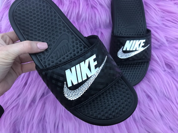 black and purple nike slides