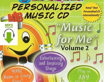 May include: A personalized music CD titled "Music for Me" Volume 2. The cover features a cartoon jukebox character and musical notes. Text includes "Sing Your Name" and "Your Name in Every Song!"