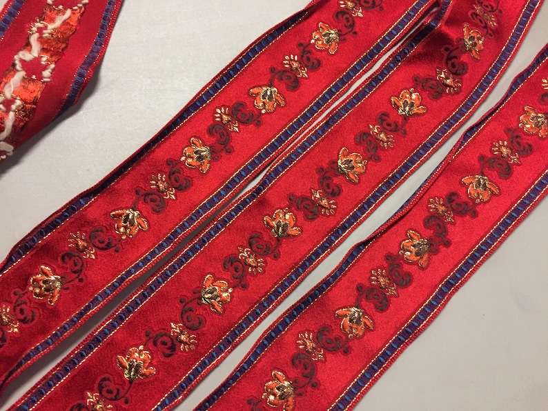 Made in France 2 inch wide Brocade Ribbon with a Navy Blue Metallic Gold Floral Pattern against a Red background Brown