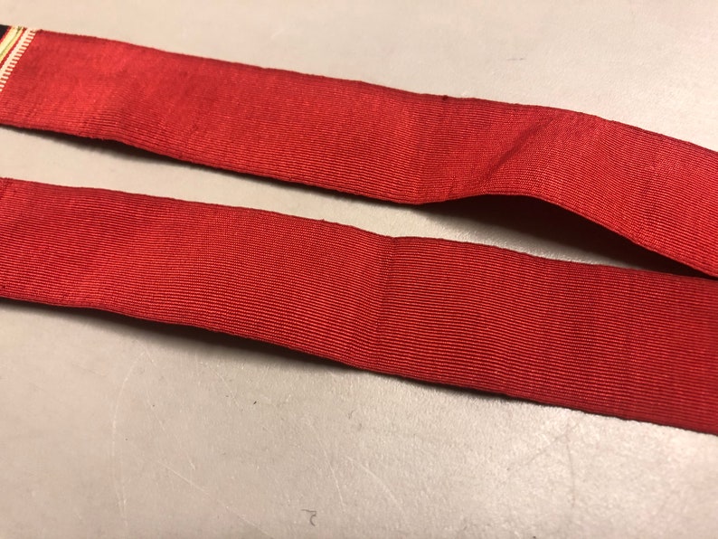 Vintage Faille Neck Stole with Striped edge White Stripe Red with White Green Black 31 inches long x 1 18 inches wide Blue