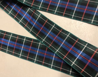 May include: Green, blue, red, and white plaid ribbon with a satin finish.