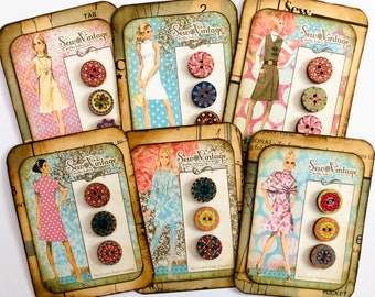 May include: Six cards with vintage illustrations of women in dresses. Each card features the text "Sew Vintage" and three wooden buttons with colorful floral patterns.