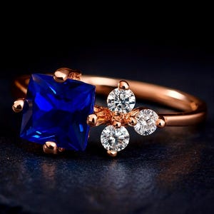 8K Solid Rose Gold Ring with Princess Cut CZ Sapphire & D Color VVS1 Moissanite Accents – Unique Blue Gemstone Engagement or Statement Ring