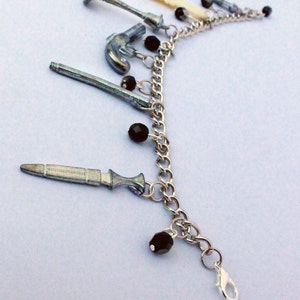 Clue Token Charm Bracelet with Black Beads