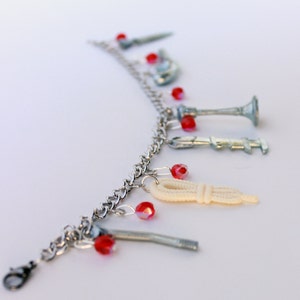 Clue Token Charm Bracelet with Blood Red Beads