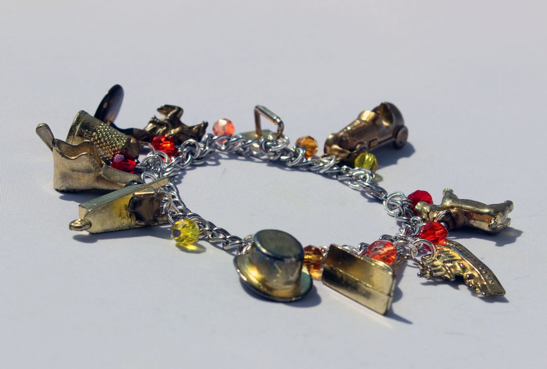 Gold Monopoly Token Charm Bracelet With Fiery Glass Beads Etsy
