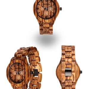 May include: Three wooden watches with a striped grain pattern. The watches have a brown and black color scheme. The watch faces have black numerals and hands. The brand name "modoly" is visible on the watch face and clasp.