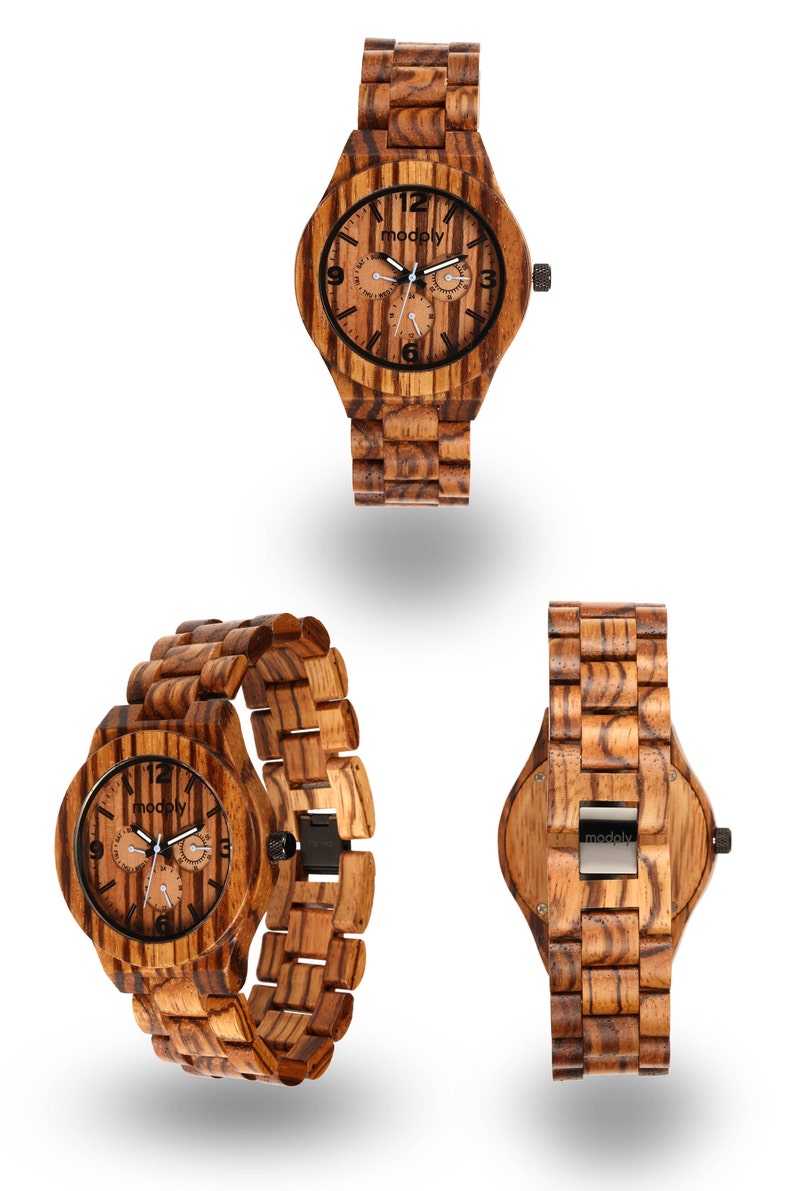 May include: Three wooden watches with a striped grain pattern. The watches have a brown and black color scheme. The watch faces have black numerals and hands. The brand name "modoly" is visible on the watch face and clasp.