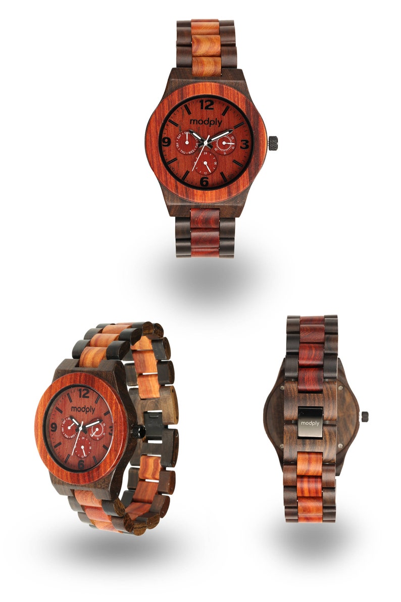 May include: Wooden watch with a reddish-brown face and a multi-toned wood band. The watch face features the brand name "modply" and three sub-dials. The watch case and band are made of a combination of dark and light wood tones.