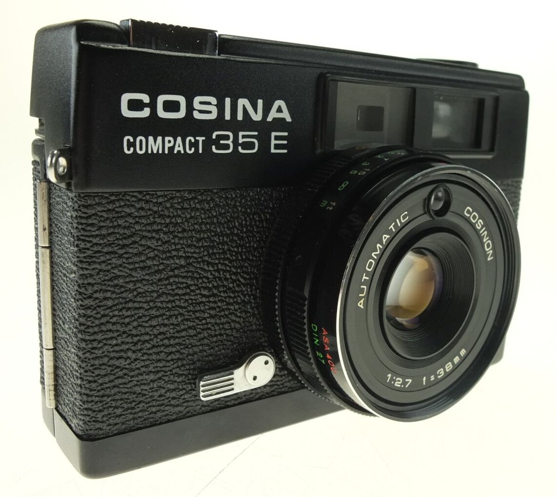 Cosina Kamera Cosina Compact 35 E mit Cosinon 38 mm f 2,7 Automatic Messsucherkamera, foto 1 di 5
