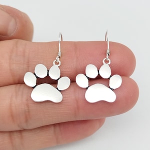Sterling Silver Paw Print Dangle Earrings: Pet Lover Jewelry