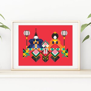 May include: A framed illustration of a traditional Japanese doll display, featuring two dolls in colorful kimonos, with lanterns and flowers. The dolls are on a red background.