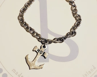 Anchored to 401 sterling silver chain link bracelet